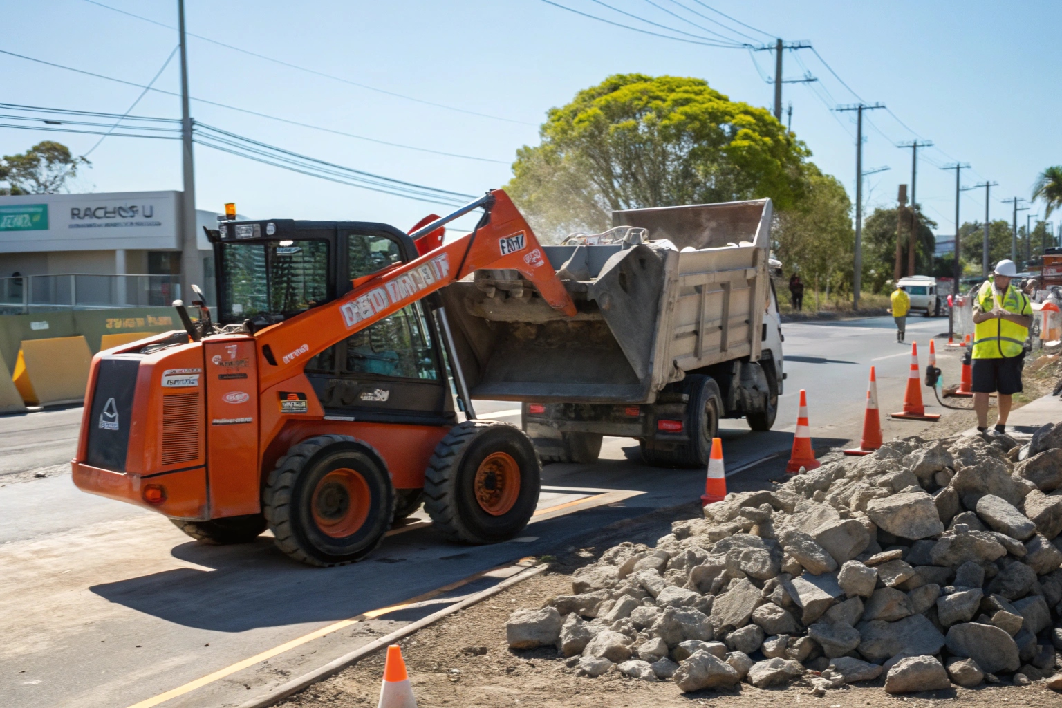 Bobcat loading demolished concrete debris for removal in Bundaberg
